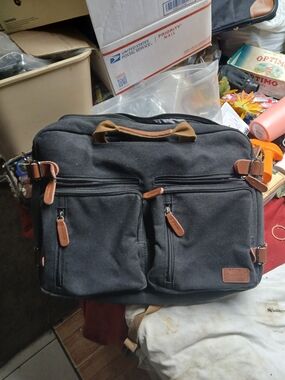 CoolBell CB-5005 convertible laptop messenger bag can be used as a Backpack